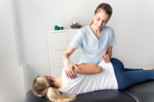 woman receiving physical therapy