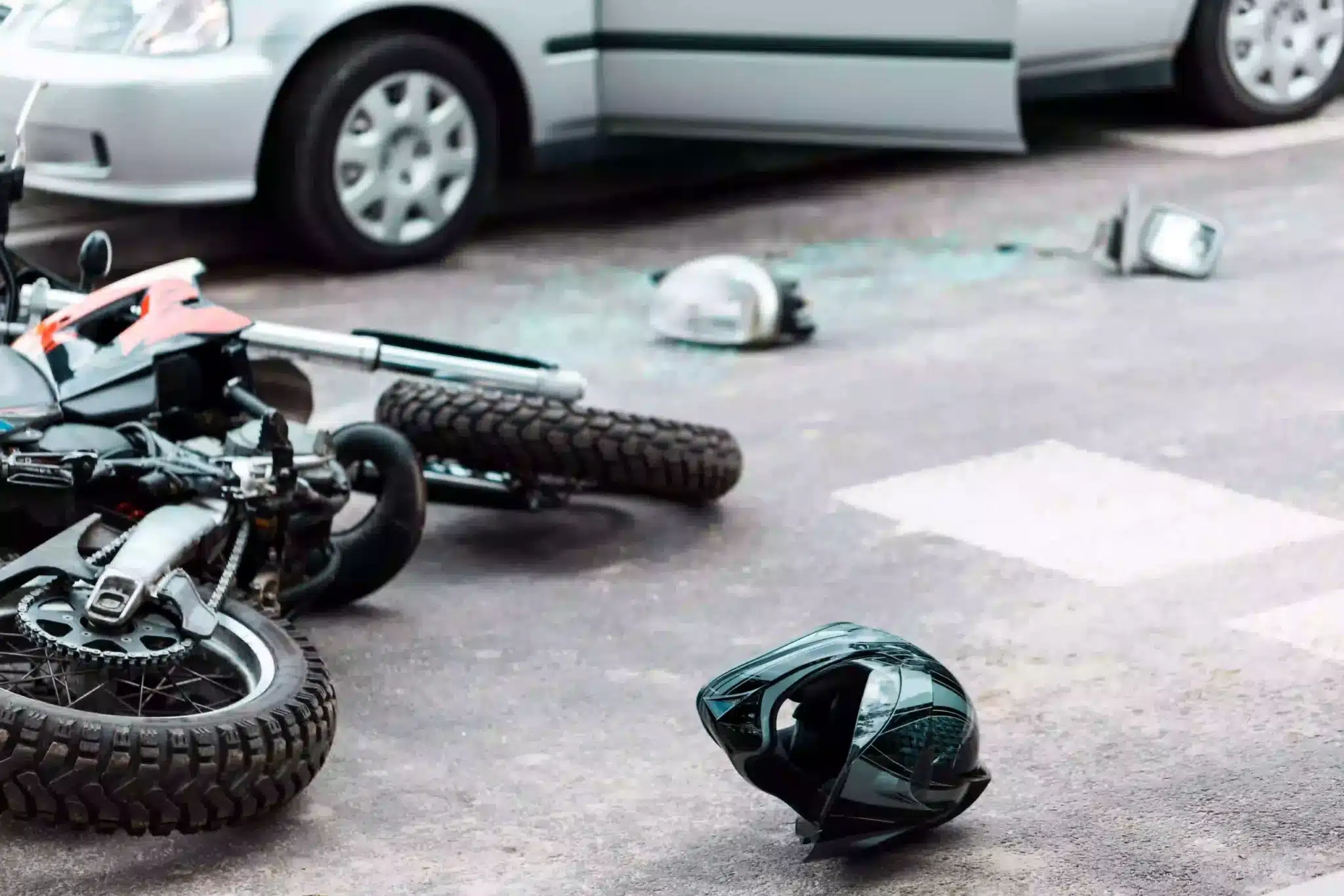 motorcycle overturned after collison with a vehicle