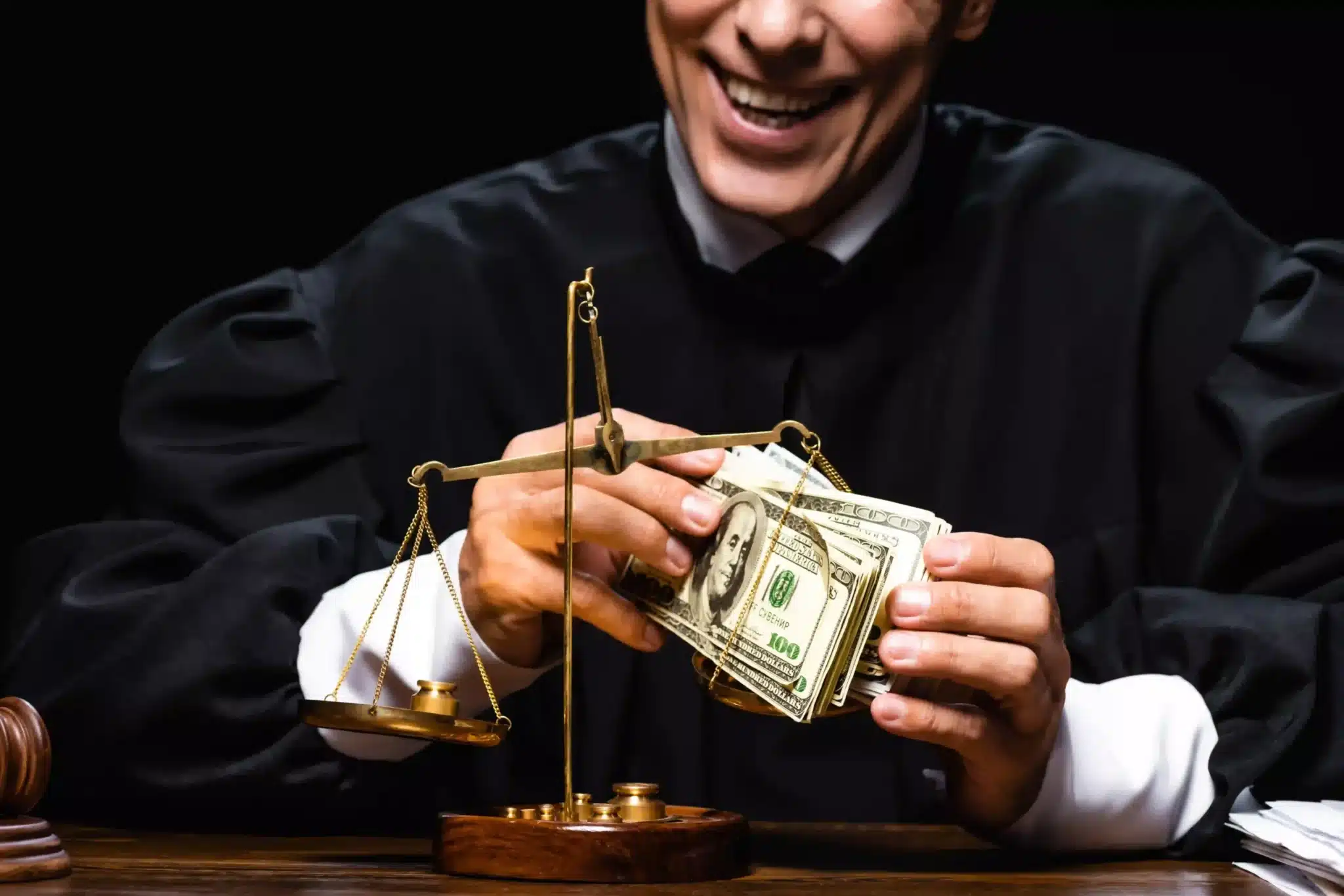 Smiling attorney with dollar banknotes and scale of justice